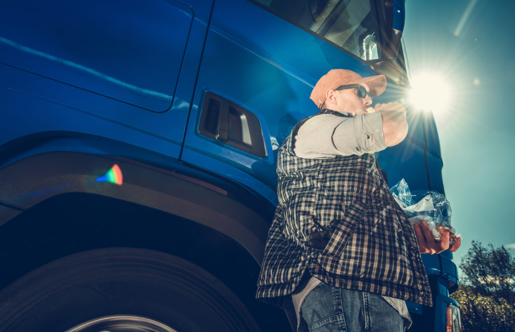 Semi,Truck,Driver,Lunch,Brake,In,The,Sun.,Caucasian,Trucker